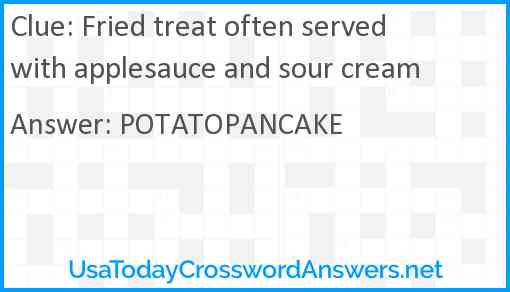 Fried treat often served with applesauce and sour cream Answer