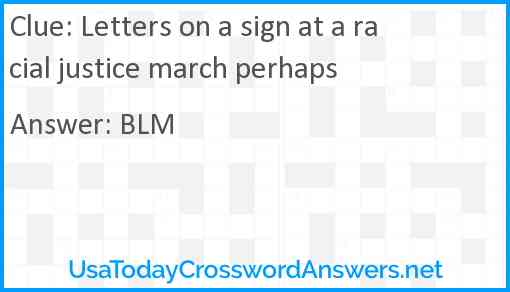 Letters on a sign at a racial justice march perhaps Answer